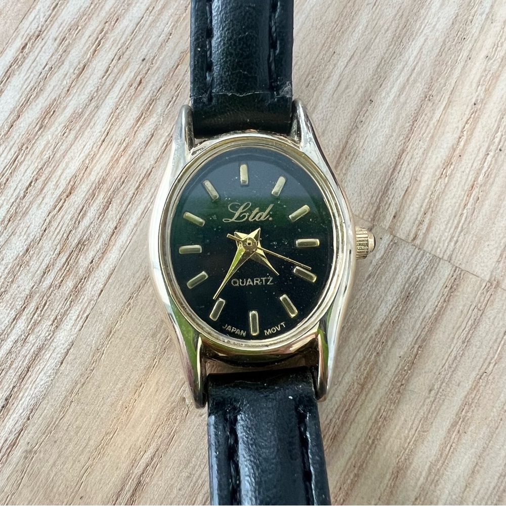 Ltd ladies black dial oval dress watch NEW BATTERY